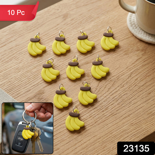 Set of 10 cute banana-shaped bag charm keychains by Wukusy, featuring colorful, playful accessories for bags and keys.