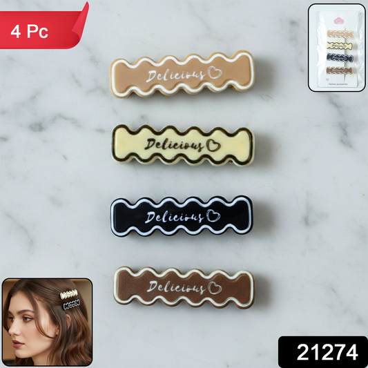 Set of four elegant Wukusy hair clips featuring stylish, decorative designs for securing hair with a sophisticated touch.