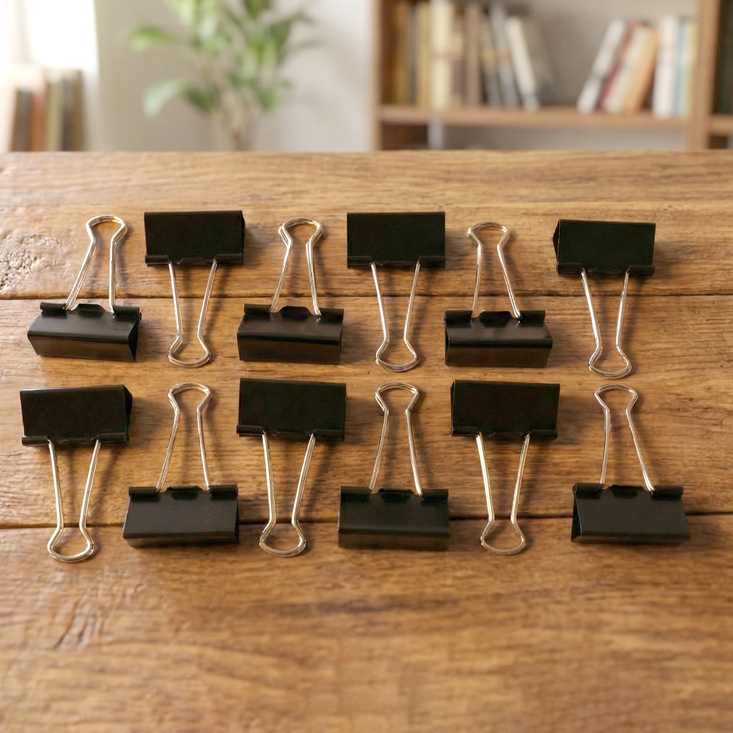 Set of 12 extra-large black binder clips by Wukusy, 41mm heavy-duty paper clamps for organizing documents and files.