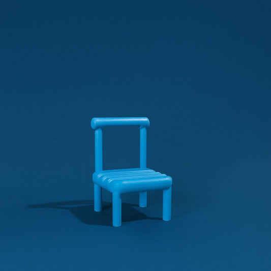 Wukusy mini chair mobile stand holder for desk and study table, compact and colorful, holds phone securely on workspace.