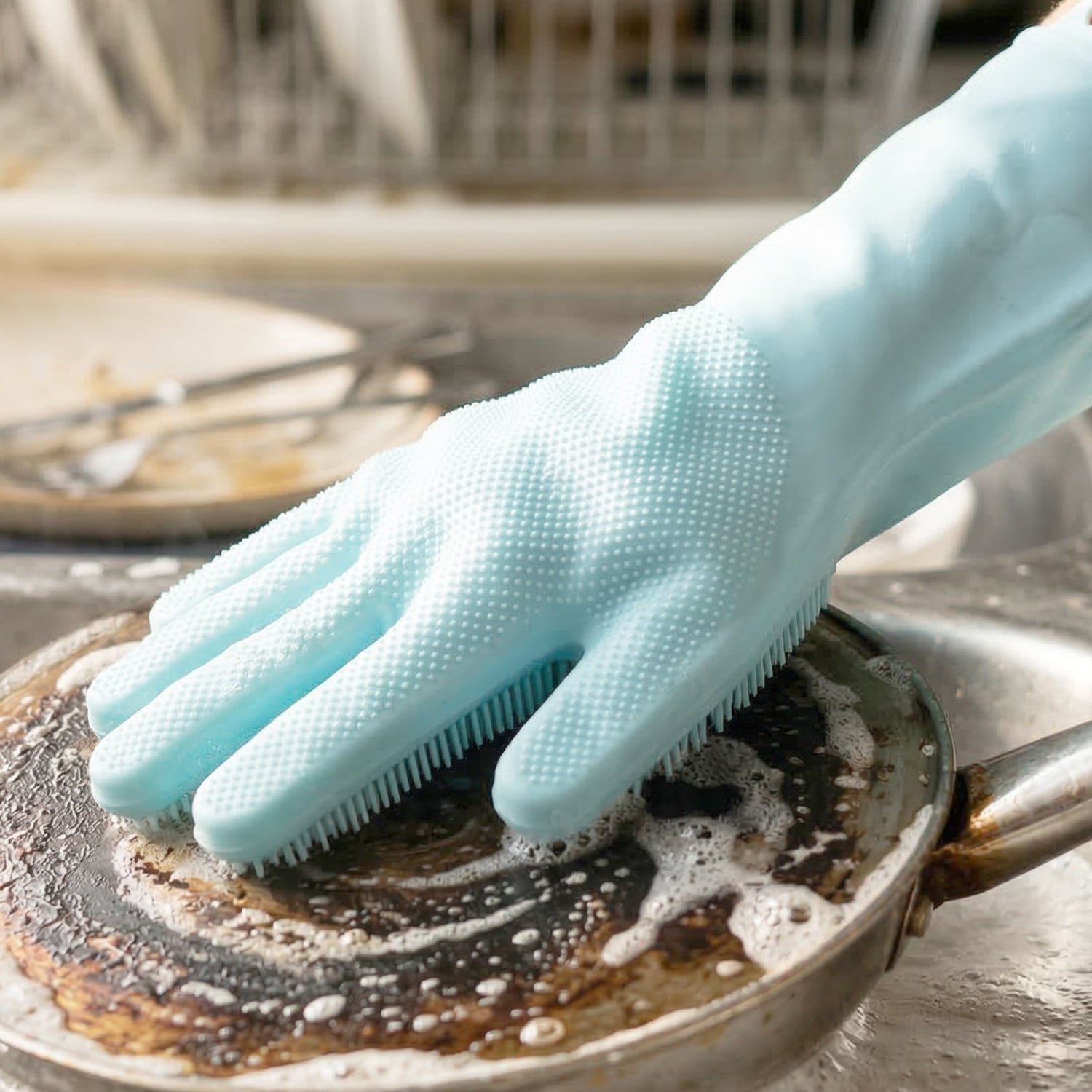 Wukusy multipurpose silicone dishwashing glove with built-in scrubber brush for effective cleaning of dishes and kitchenware.