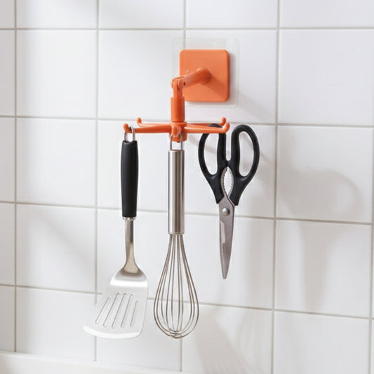 Orange Wukusy 360 rotating wall-mounted kitchen utensils hook stand with multiple hooks for organized cooking tools.