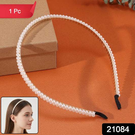 Wukusy premium pearl-embellished slim hairband with small pearl accents, styled on a neutral background.