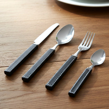 Wukusy 24-piece stainless steel kitchen cutlery set with plastic handles and tray, including knives, forks, and spoons arranged neatly