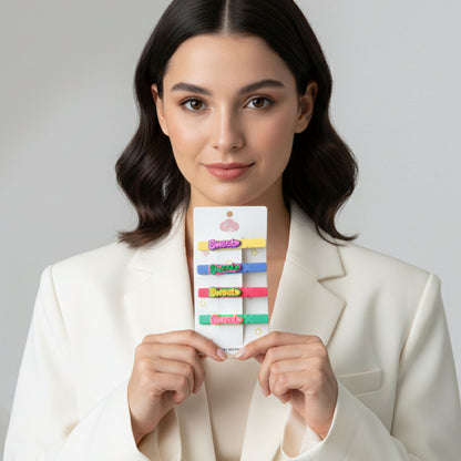 Set of four Wukusy decorative hair clips with sweet text designs, perfect for adding a charming touch to hairstyles.