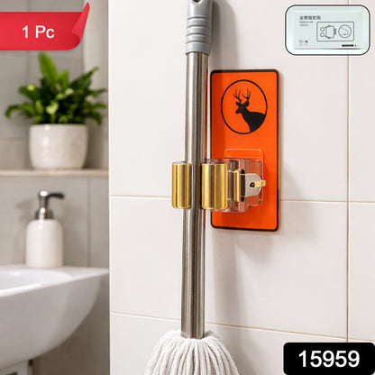 Wall-mounted Wukusy mop holder clip for bathroom and kitchen, designed to organize brooms and mops efficiently.