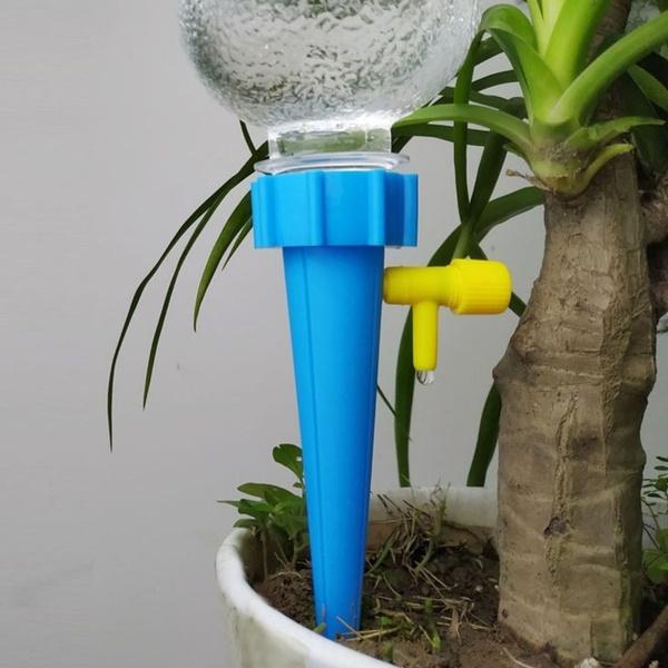 Wukusy garden drip irrigation kit with self-watering spikes for home garden plants, providing efficient watering system.