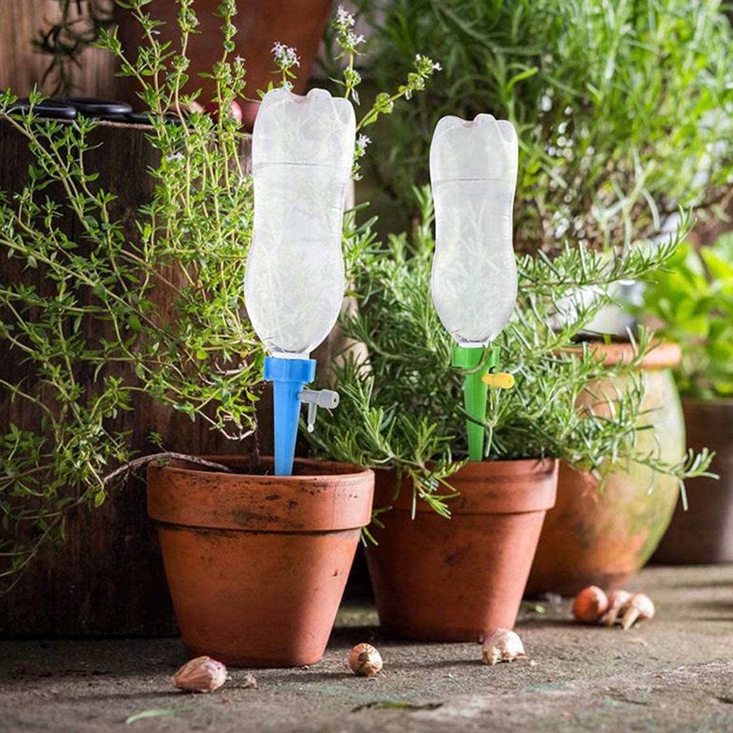 Wukusy garden self-watering plant spike with adjustable water dripper and slow-release control valve for indoor and outdoor plants.