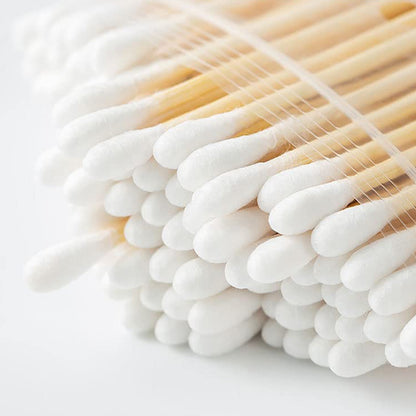 Wukusy bamboo cotton swabs with wooden handles, double-headed for makeup, ear cleaning, and wound care, eco-friendly biodegradable pack of 20.