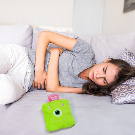 Green One Eye Monster print small hot water bag with cover, Wukusy health care product for pain relief and warmth.