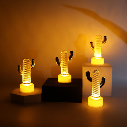 Set of four Wukusy decorative cactus-shaped flameless LED candles for home decor, featuring warm, flickering light.
