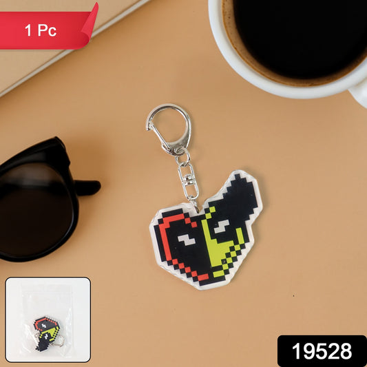 Pixel style acrylic cartoon keychain with funky design, featuring colorful, playful artwork, ideal for home decor or accessories.