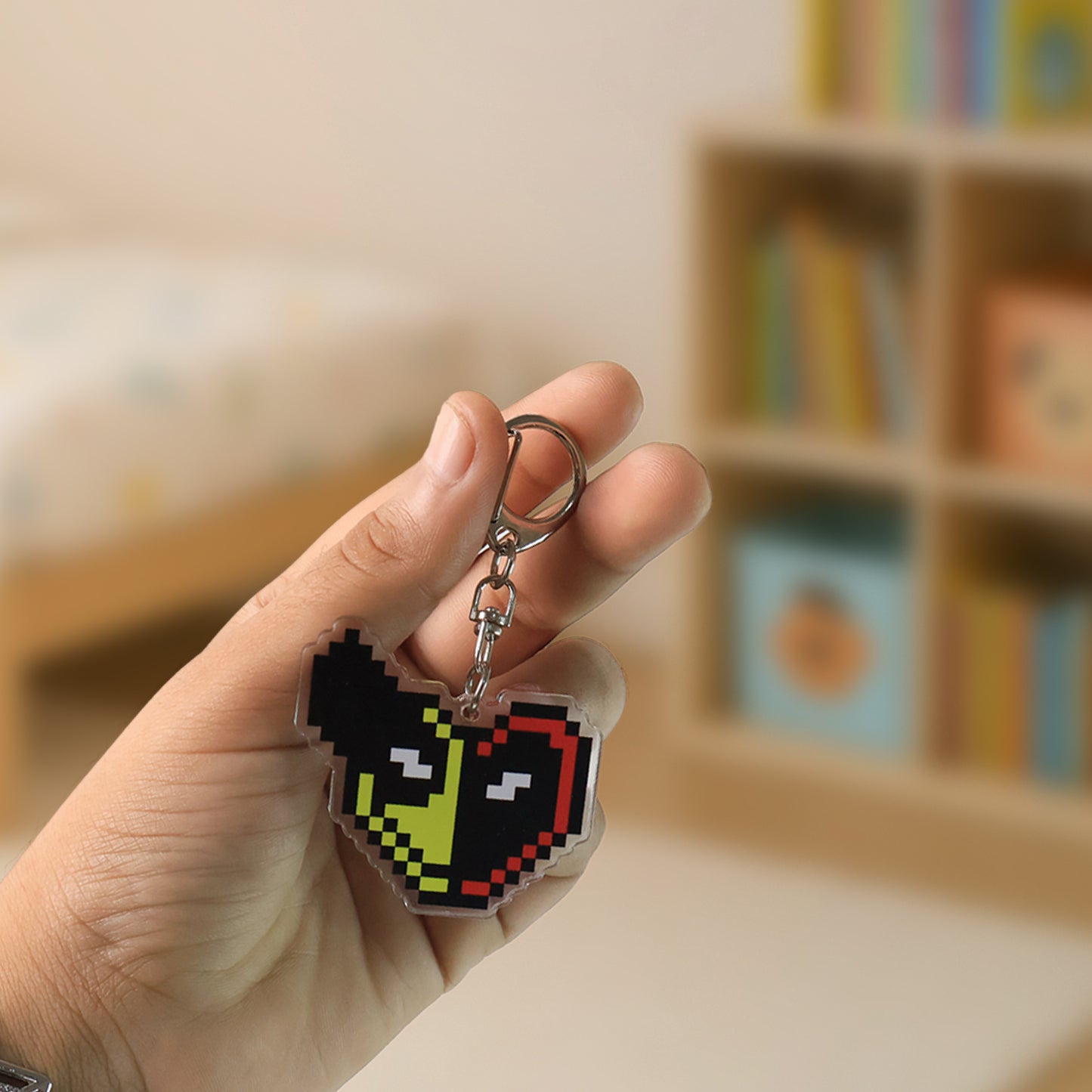 Pixel style acrylic cartoon keychain with a funky design, featuring vibrant colors and fun character details for home decor.