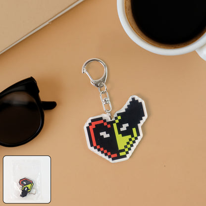 Pixel style acrylic cartoon keychain with funky design, featuring colorful, playful artwork, ideal for home decor or accessories.