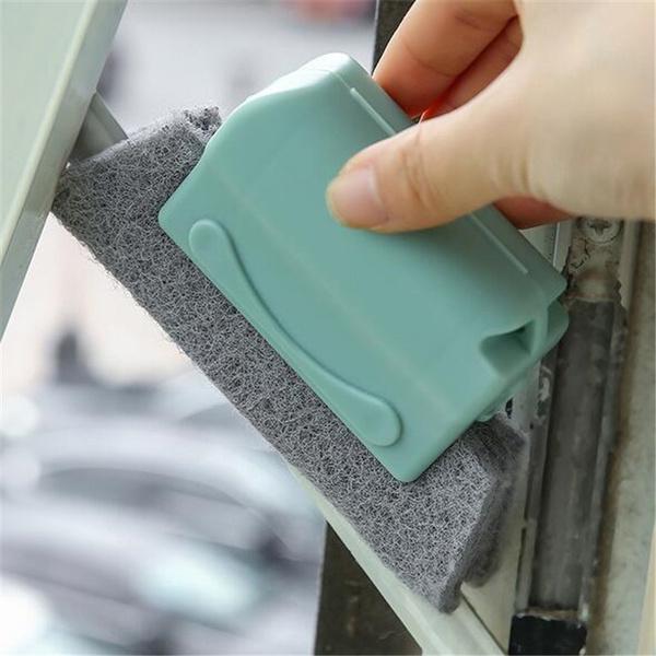 Wukusy Creative Window Groove Cleaning Brush, hand-held home improvement tool for cleaning narrow window edges and grooves.