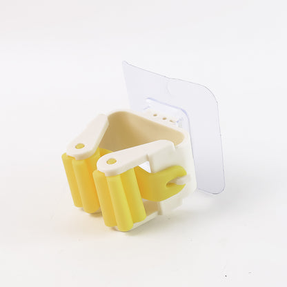 Wukusy Magic Sticker Series self-adhesive mop and broom holder for home organization, mounted on a wall with cleaning tools.