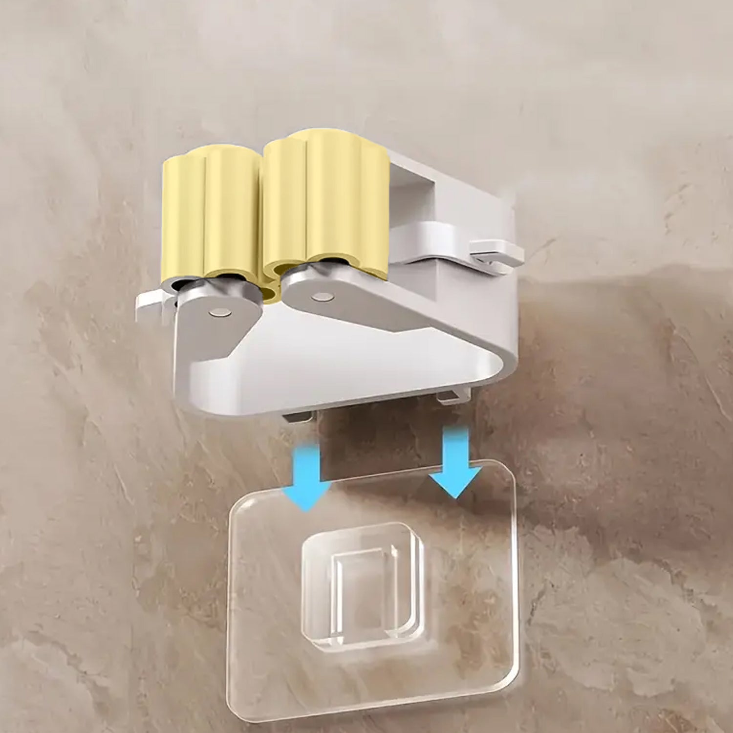 Wukusy Magic Sticker Series self-adhesive mop and broom holder for home organization, mounted on a wall.