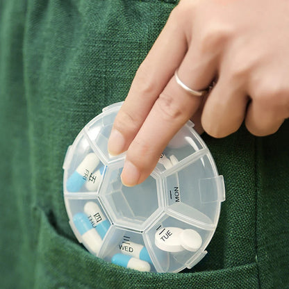 Wukusy 7-sided portable pill box and medicine planner small case for organizing pills at home or on the go.
