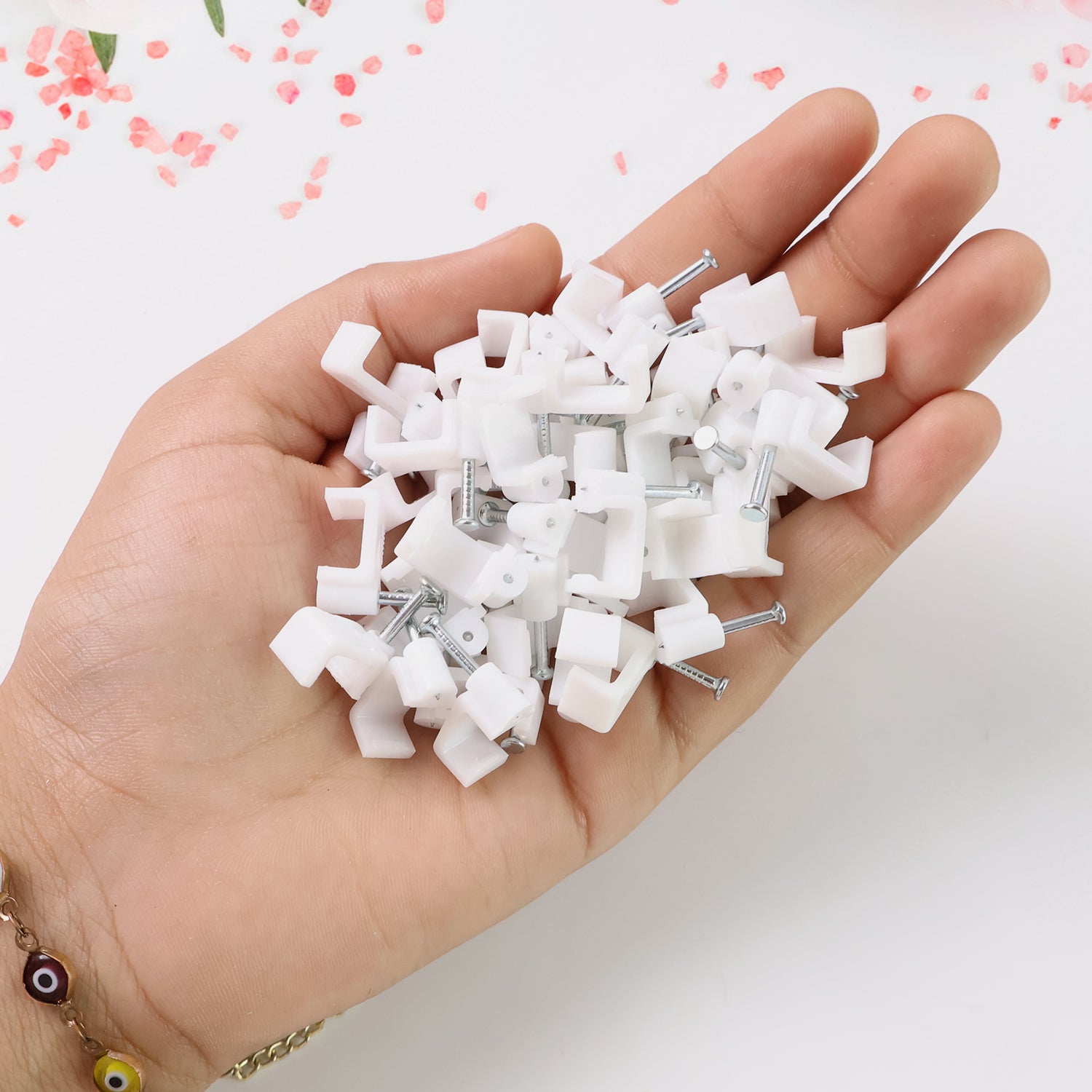 Set of 50 Wukusy 8mm nail cable clips for home improvement, designed to secure cables neatly and safely.