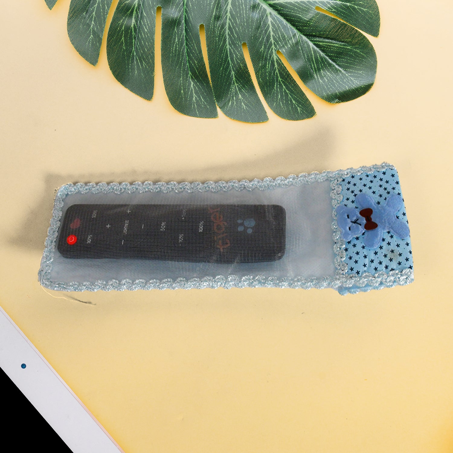 Wukusy cartoon cloth lace remote control cover, large size 248 cm, designed to protect and decorate remote controls.
