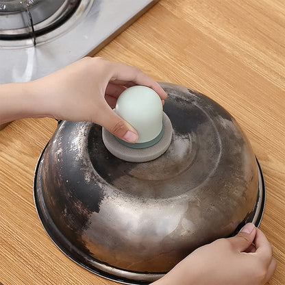 Wukusy Pro Clean heavy-duty kitchen scrubber for tough cleaning, shown with textured scrubbing surface and ergonomic handle.