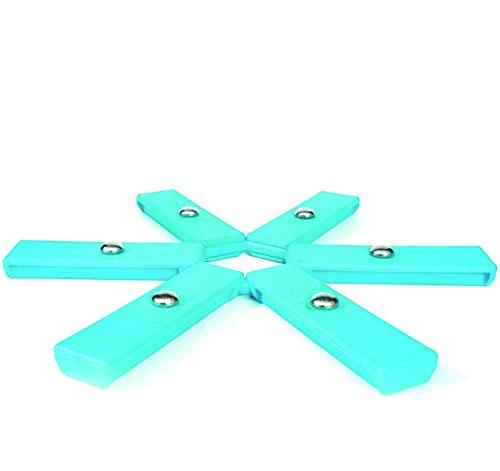 Wukusy foldable non-slip heat-resistant kitchen hot mat on countertop, designed for protecting surfaces from hot cookware.