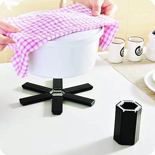 Foldable Wukusy heat-resistant kitchen hotmat with non-slip surface, ideal for protecting countertops from hot cookware.