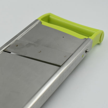 Wukusy 2-in-1 potato slicer for home kitchen use, showing the device with potatoes for slicing and cutting tasks.