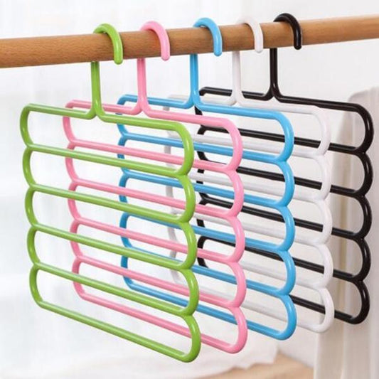 Wukusy 5-in-1 multipurpose plastic hanger with five layers, versatile for home and kitchen organization, assorted colors.