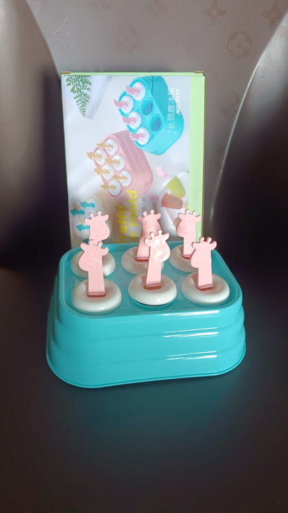 Wukusy plastic 6-cavity giraffe-shaped popsicle molds for homemade ice pops in a home kitchen setting.
