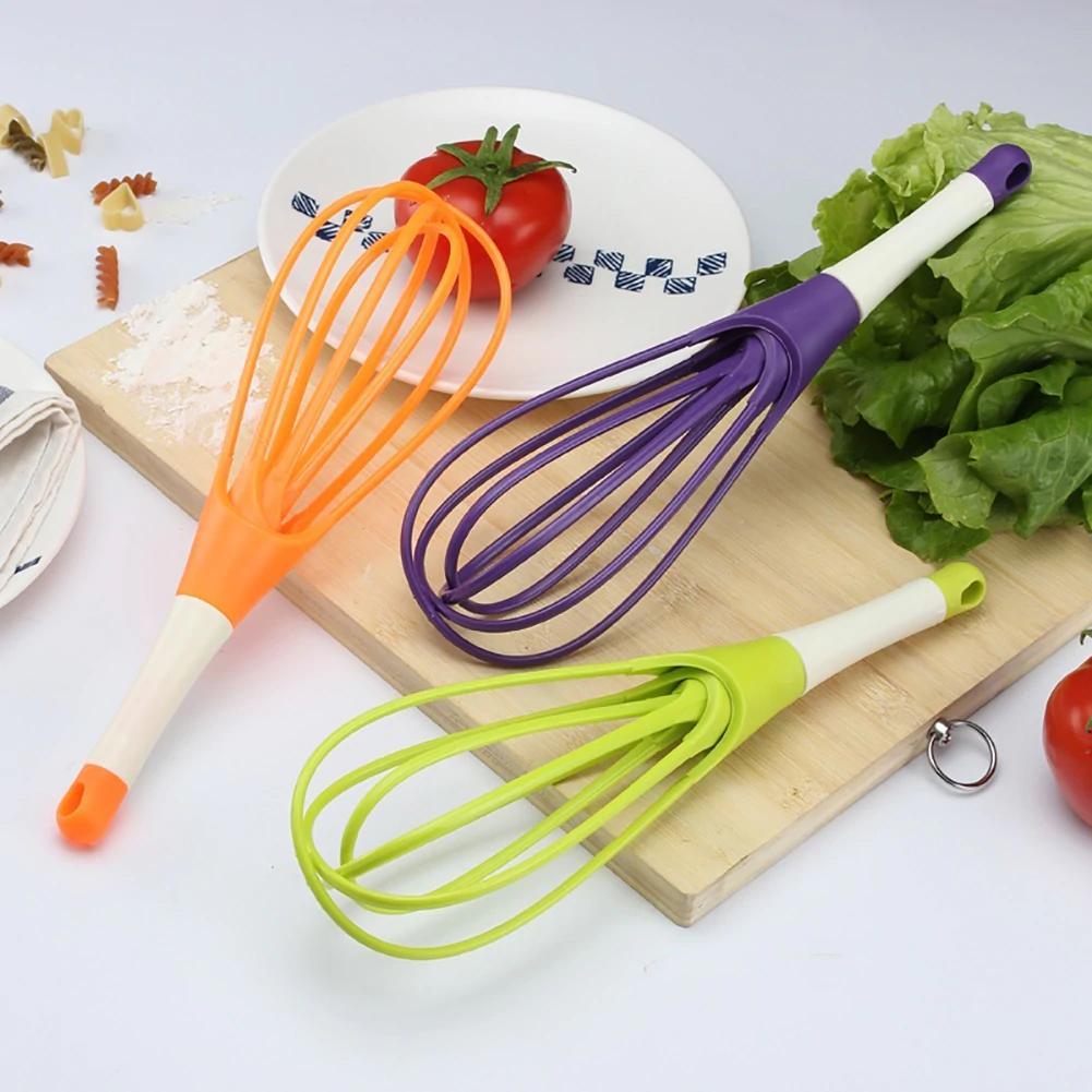 Wukusy plastic balloon whisk mixer for milk, coffee, eggs, and juice, ideal for home kitchen mixing and whipping tasks.