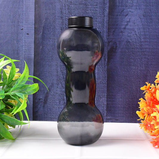 Wukusy 550ml dumbbell-shaped water bottle for gym and home use, featuring a sleek design and durable plastic body.