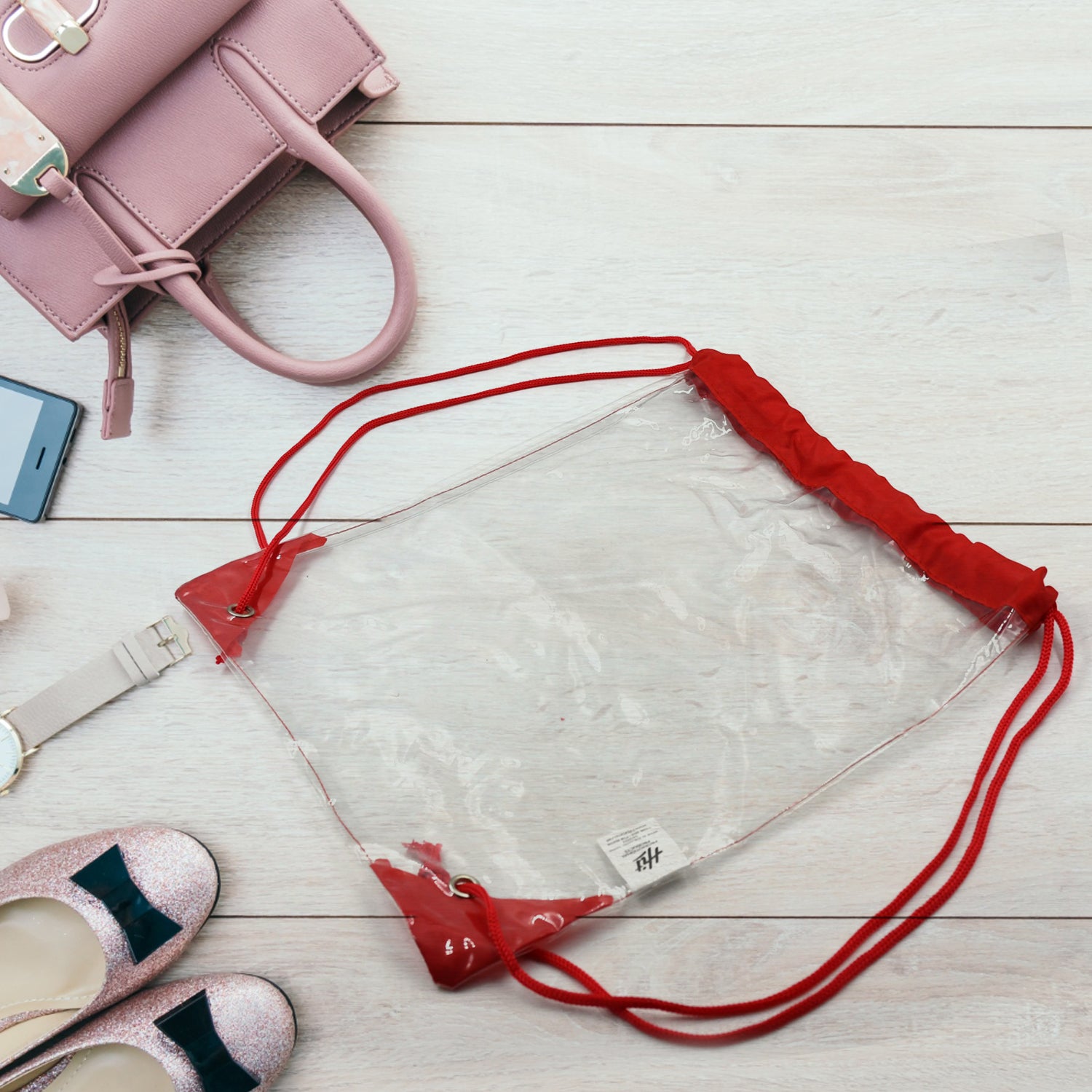 Wukusy transparent waterproof plastic stadium bag with clear string design, suitable for gym, travel, beach, swimming, and sporting events.