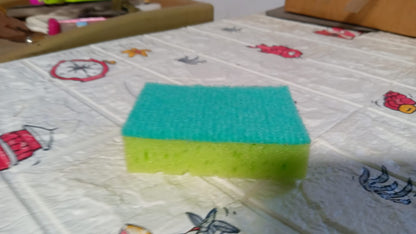 Wukusy multi-purpose 2-in-1 color scrub sponge for dishwashing, furniture cleaning, and household surfaces, with high friction resistance.