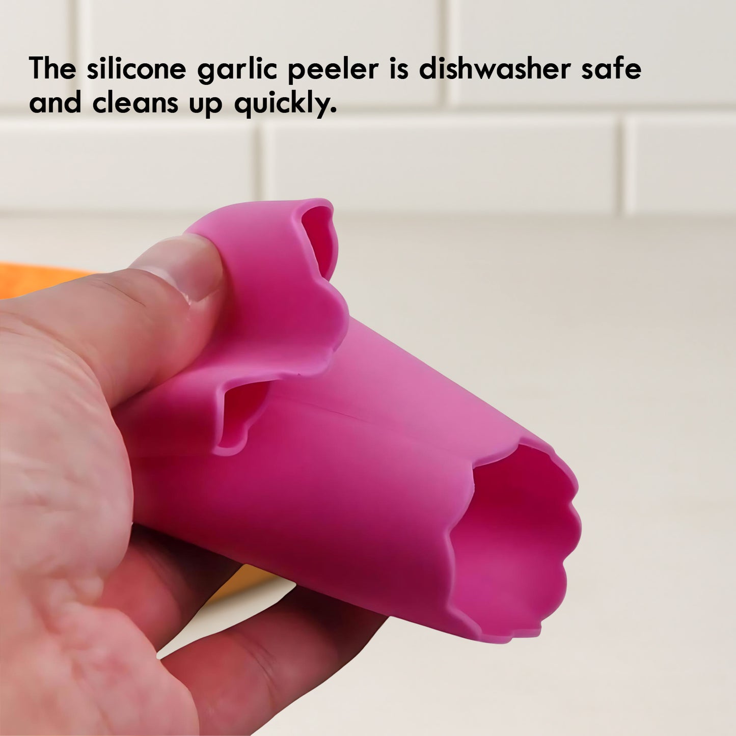 Wukusy silicone garlic peeler tube and hand roller peeling tool for easy garlic cloves removal in kitchen.