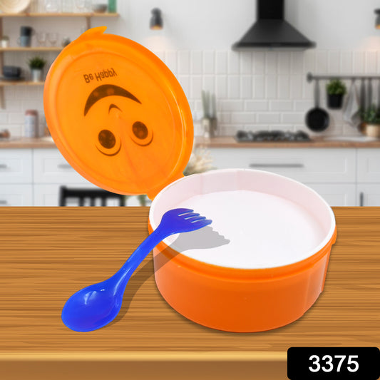 Small Wukusy Smily plastic lunch box with 2-in-1 spoon, ideal for kids' meals, compact and portable for home and kitchen use.