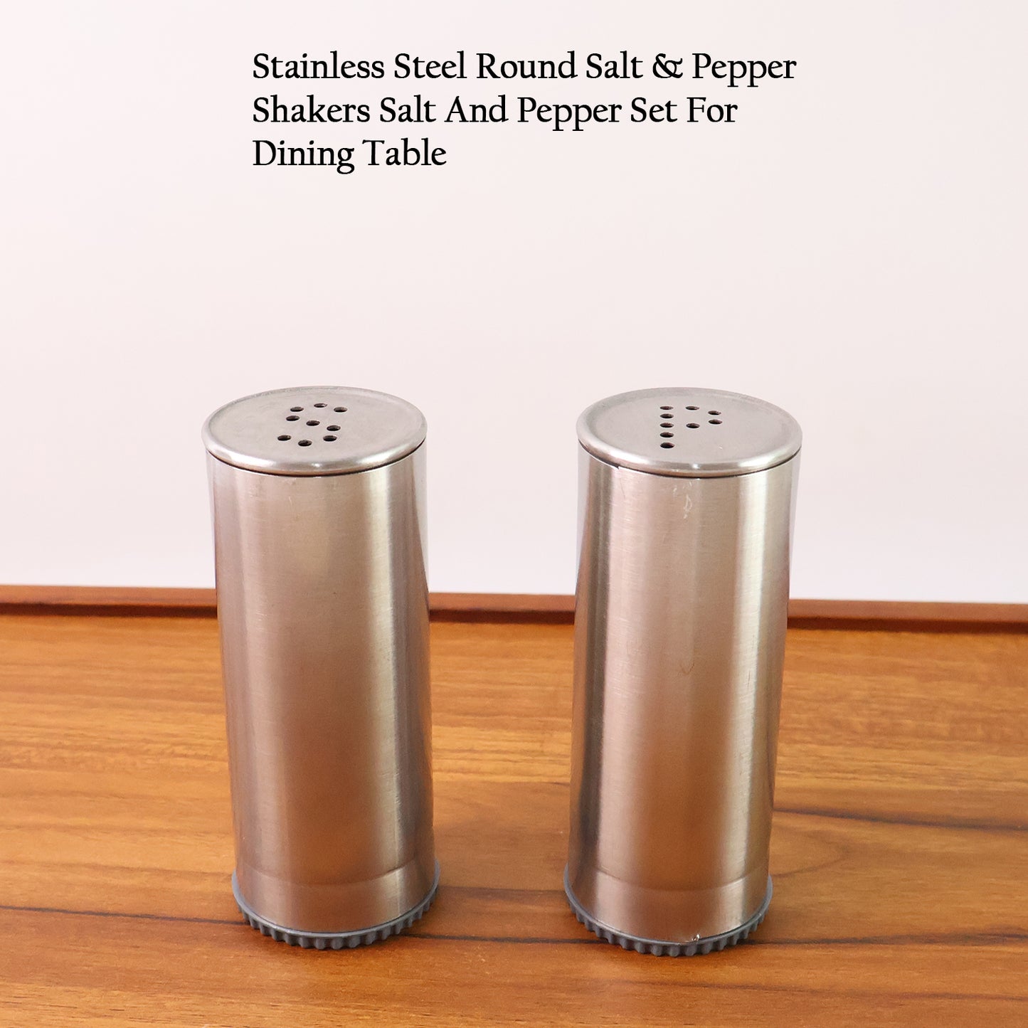 Stainless steel salt and pepper shaker set by Wukusy, 2-piece kitchen condiment shakers with sleek modern design.