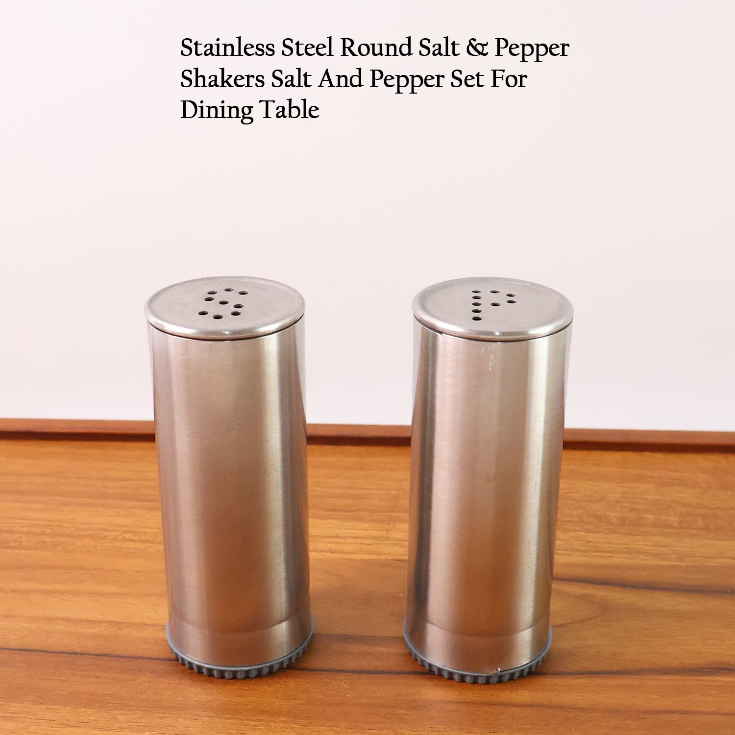 Stainless steel salt and pepper shaker set by Wukusy, 2-piece kitchen condiment shakers with sleek modern design.