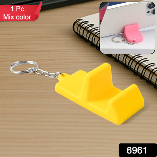 Wukusy plastic 2-in-1 mobile stand keychain displaying a compact mobile accessory with stand and keychain features.