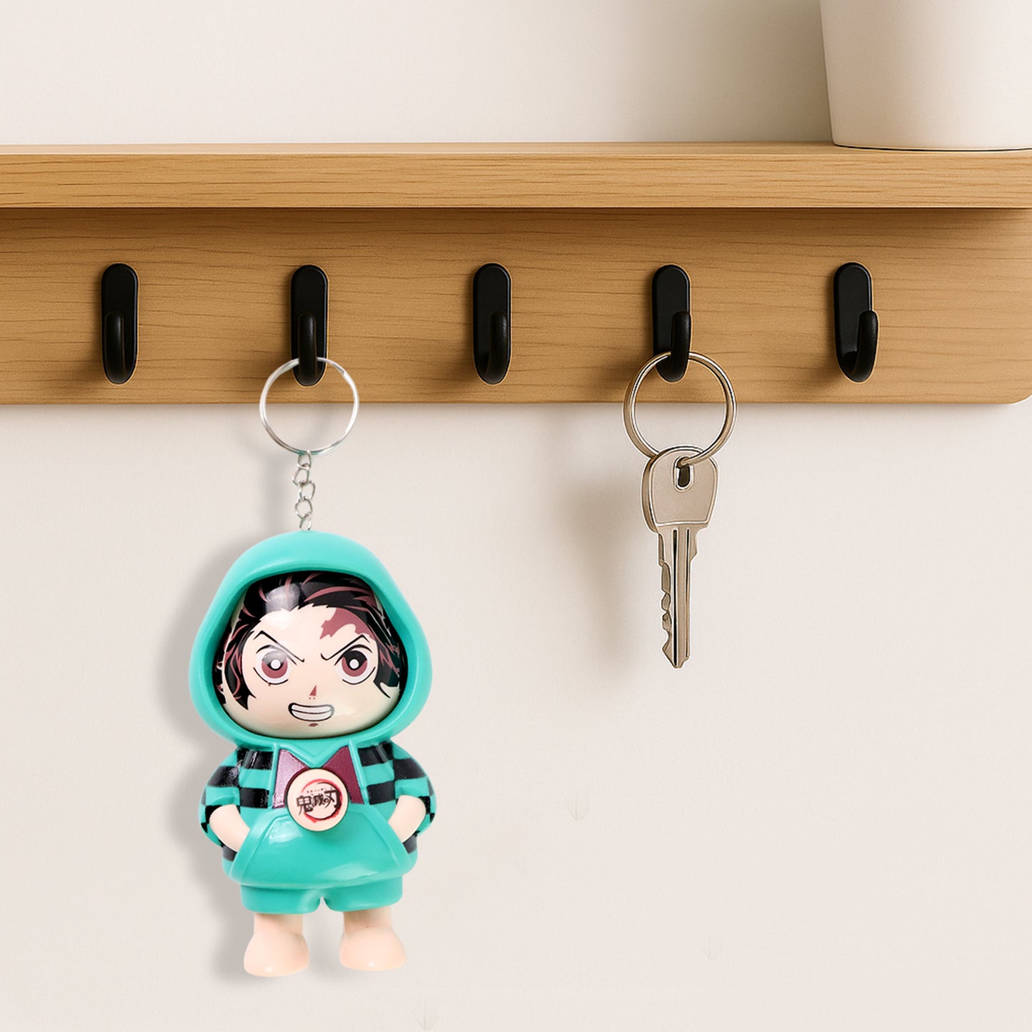 Cute cartoon character action figure keychain by Wukusy, featuring a playful design and vibrant colors.