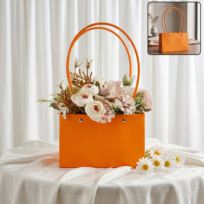 Foldable flower packaging bag with handle for bouquets and gifts, made by Wukusy, shown opened with floral design.