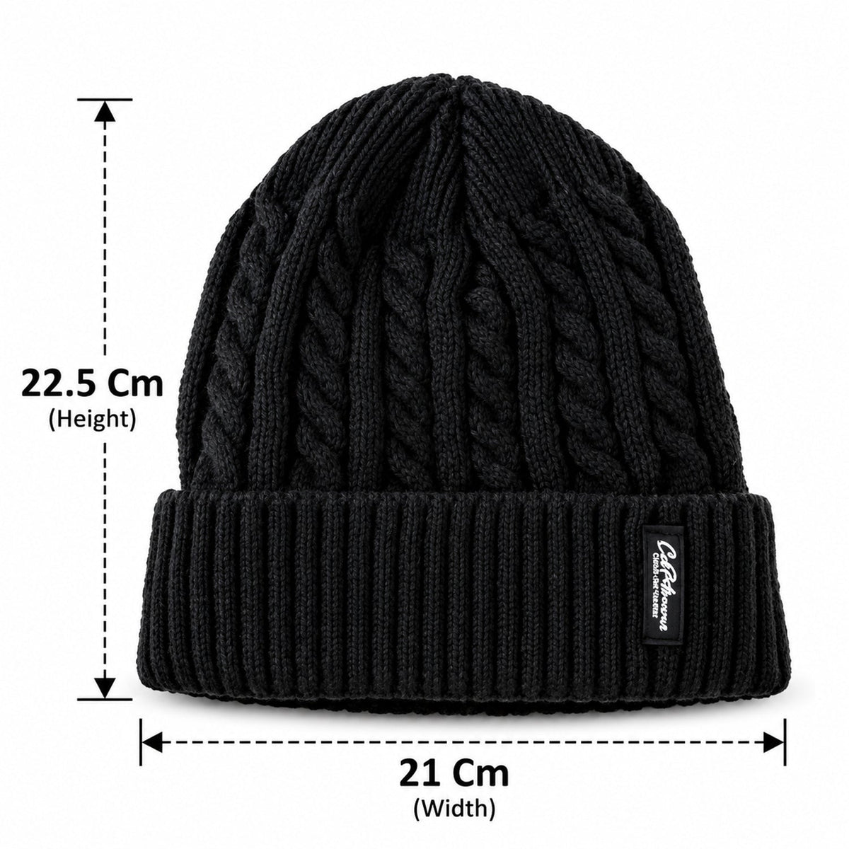 Wukusy winter cable knit beanie cap with fleece lining and folded ribbed cuff, shown in a close-up view.