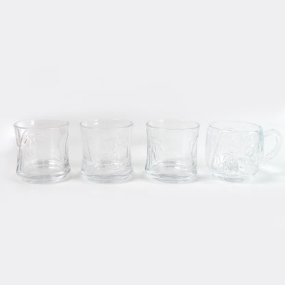 Set of four Wukusy glass tumblers and cups, clear 3-piece and 1-piece set, showcasing sleek, transparent glassware for beverages.