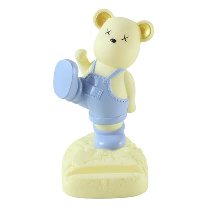 Wukusy magnetic bear LED night lamp and phone stand on a desk, with a soft glow suitable for kids' rooms and night lighting.