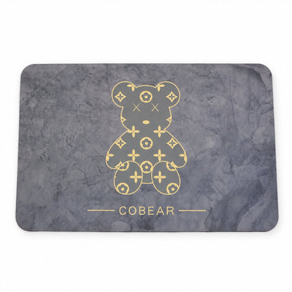 Gray absorbent bathroom mat with golden bear print, quick-drying fabric, 60x40 cm from Wukusy.