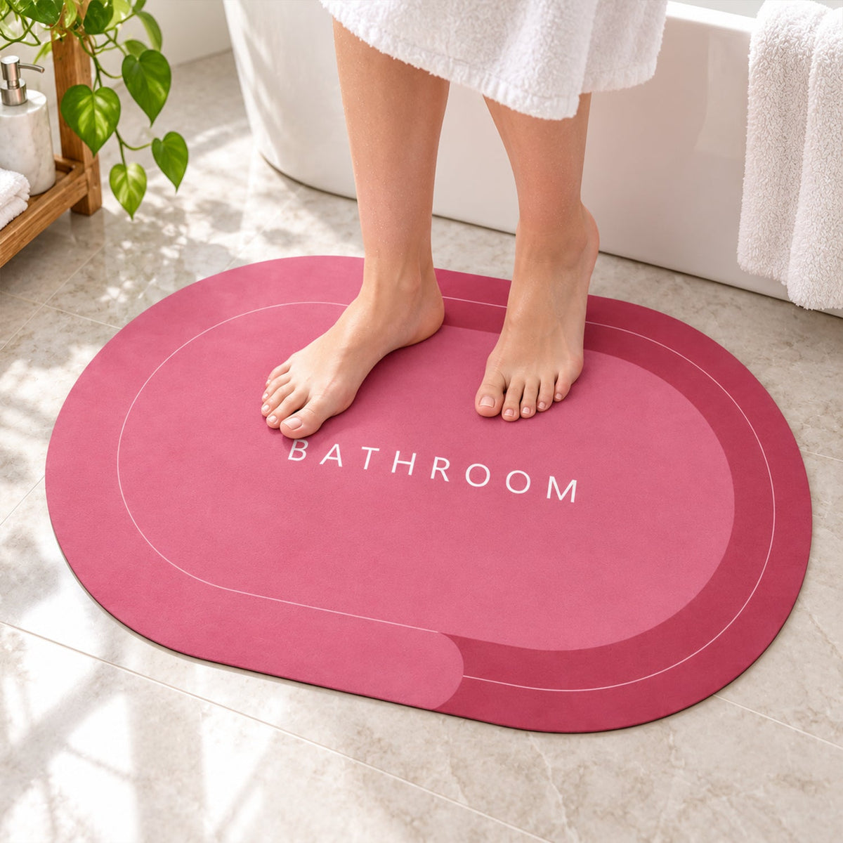 Wukusy two-tone oval bathroom rug with water-absorbing, anti-skid backing, measuring 58.5x39 cm, in a stylish design.
