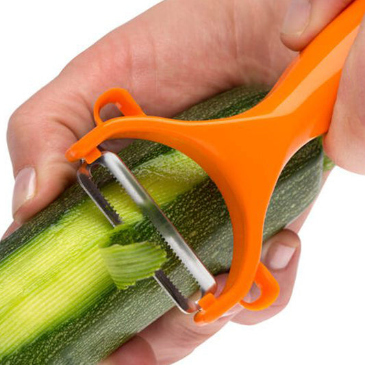 Wukusy vegetable and fruit peeler for kitchen use, stainless steel blade with ergonomic handle for easy peeling.