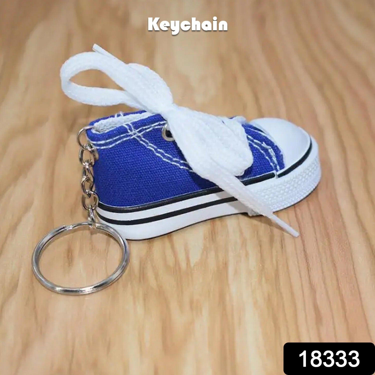Wukusy Mini Shoes keychain, a stylish travel accessory, attached to a backpack, perfect as a gift or decorative bag charm
