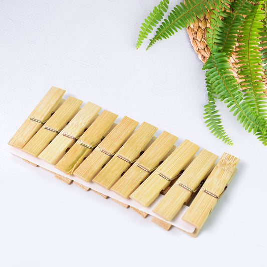 Set of 10 heavy duty bamboo wooden cloth clips pegs by Wukusy for home improvement and laundry tasks.