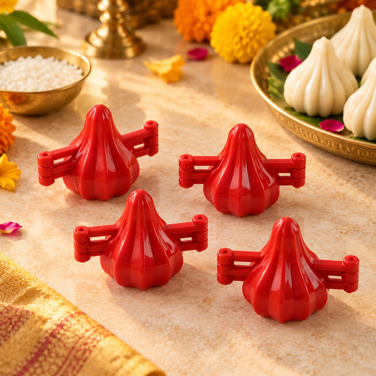 Wukusy plastic modak maker mold set for homemade sweets, includes four pieces for Ganesh Chaturthi celebrations.